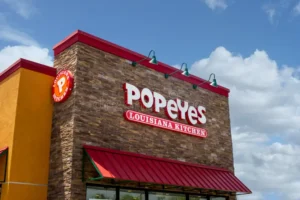 TellPopeyes survey website page asking customers to enter restaurant number and visit details