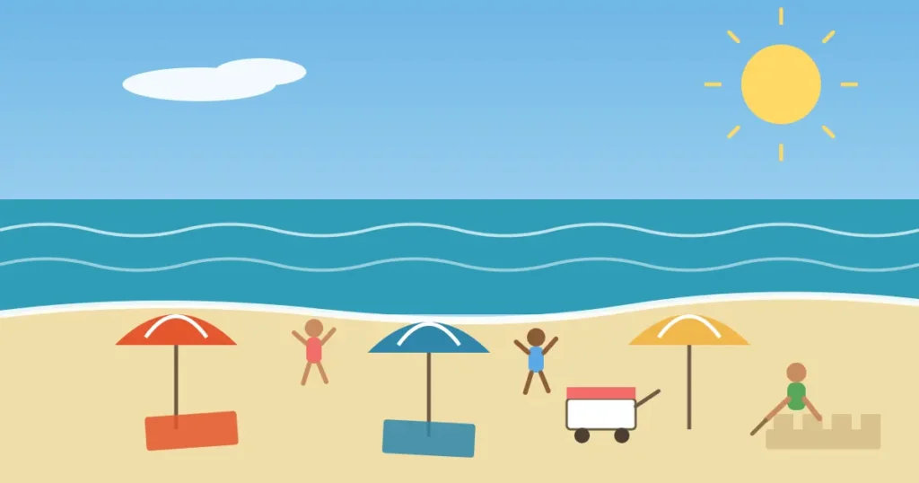 Crowded afternoon beach with umbrellas and a child building a sand wall